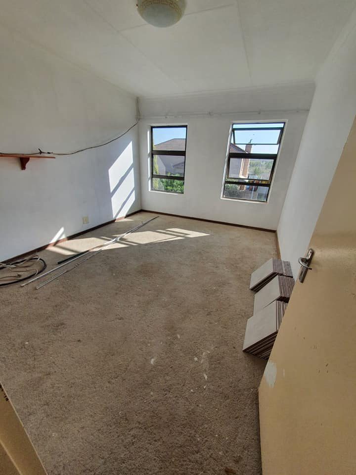 Interior room stripped back to screed before new floor tiling